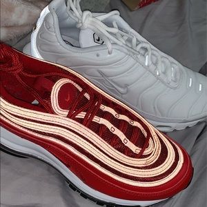 two pairs of nike shoes